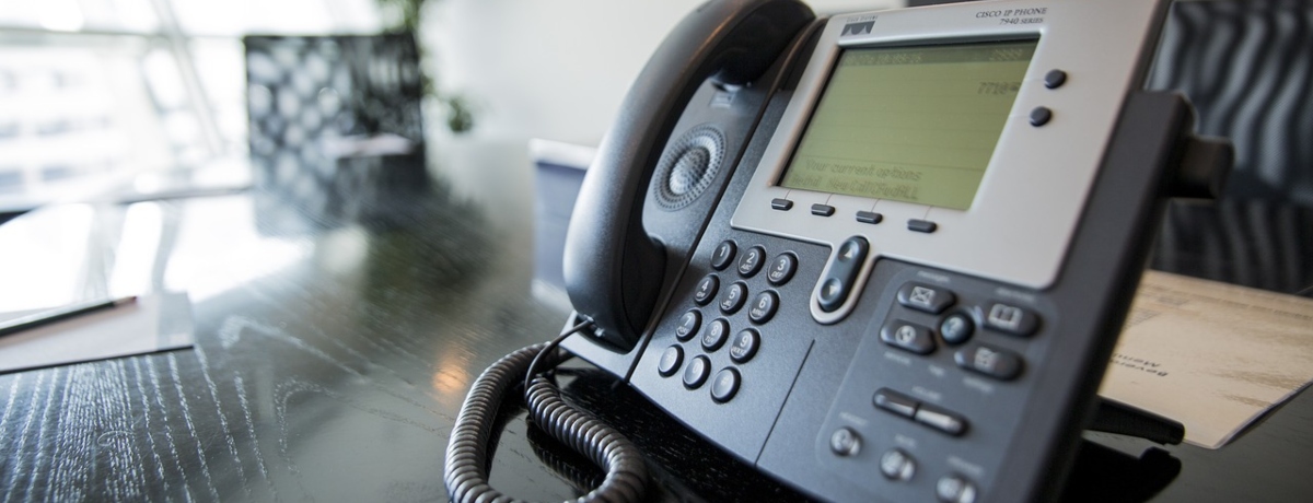 Office phone on table Image by websubs from Pixabay 