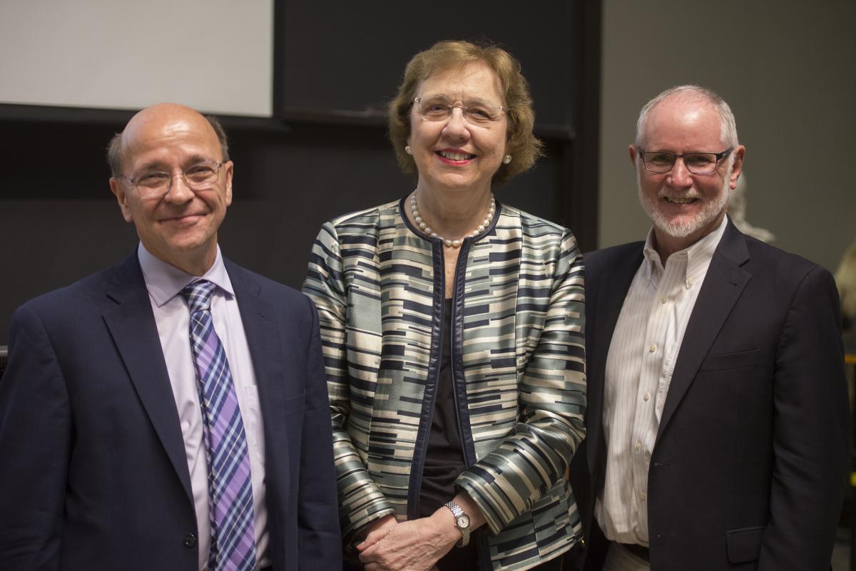 Joe Antos and Len Nichols with attendee of Seidman Lecture