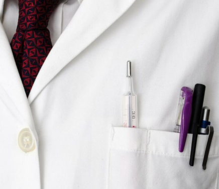 Doctor coat with pens in pocket