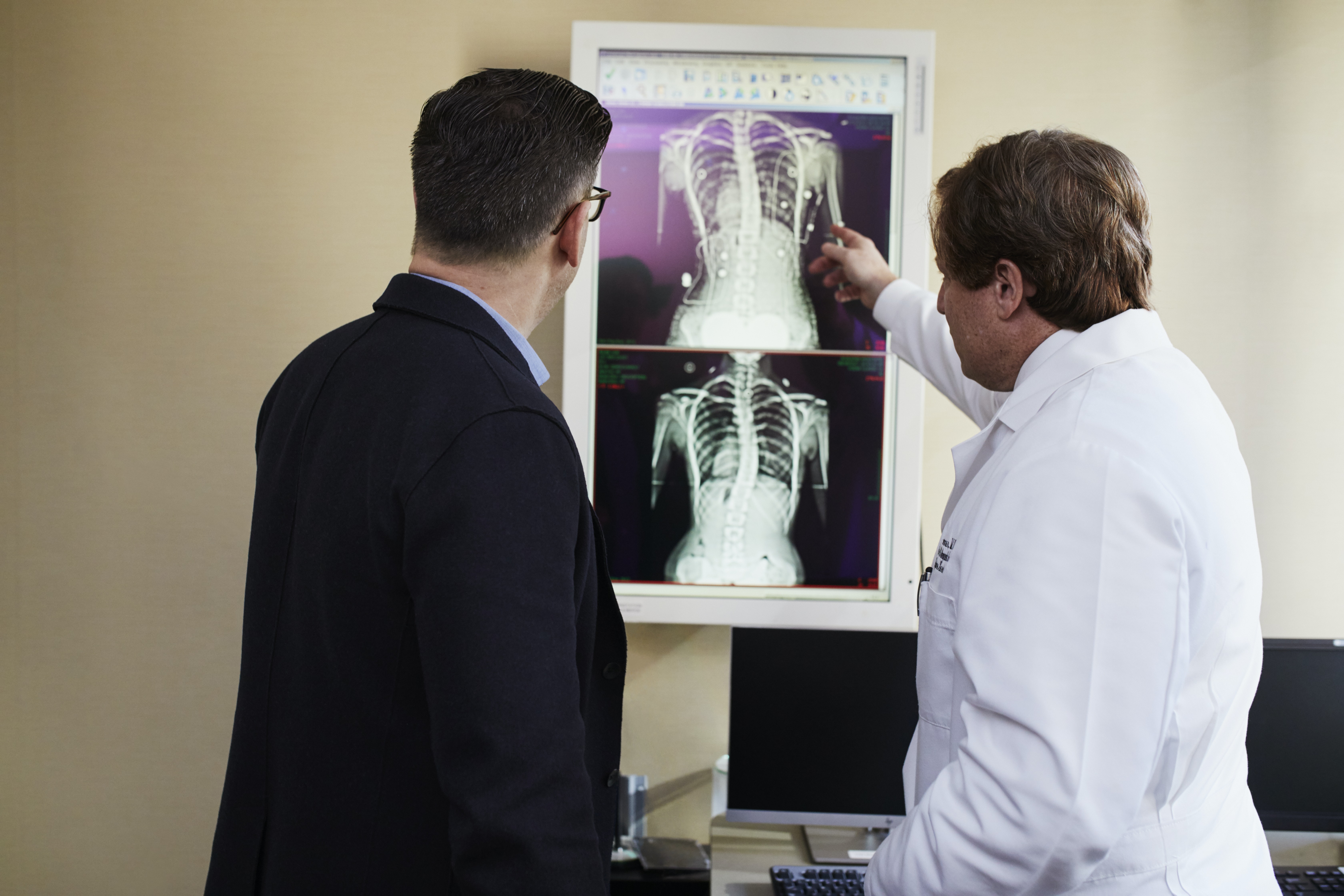 Doctor pointing to xray