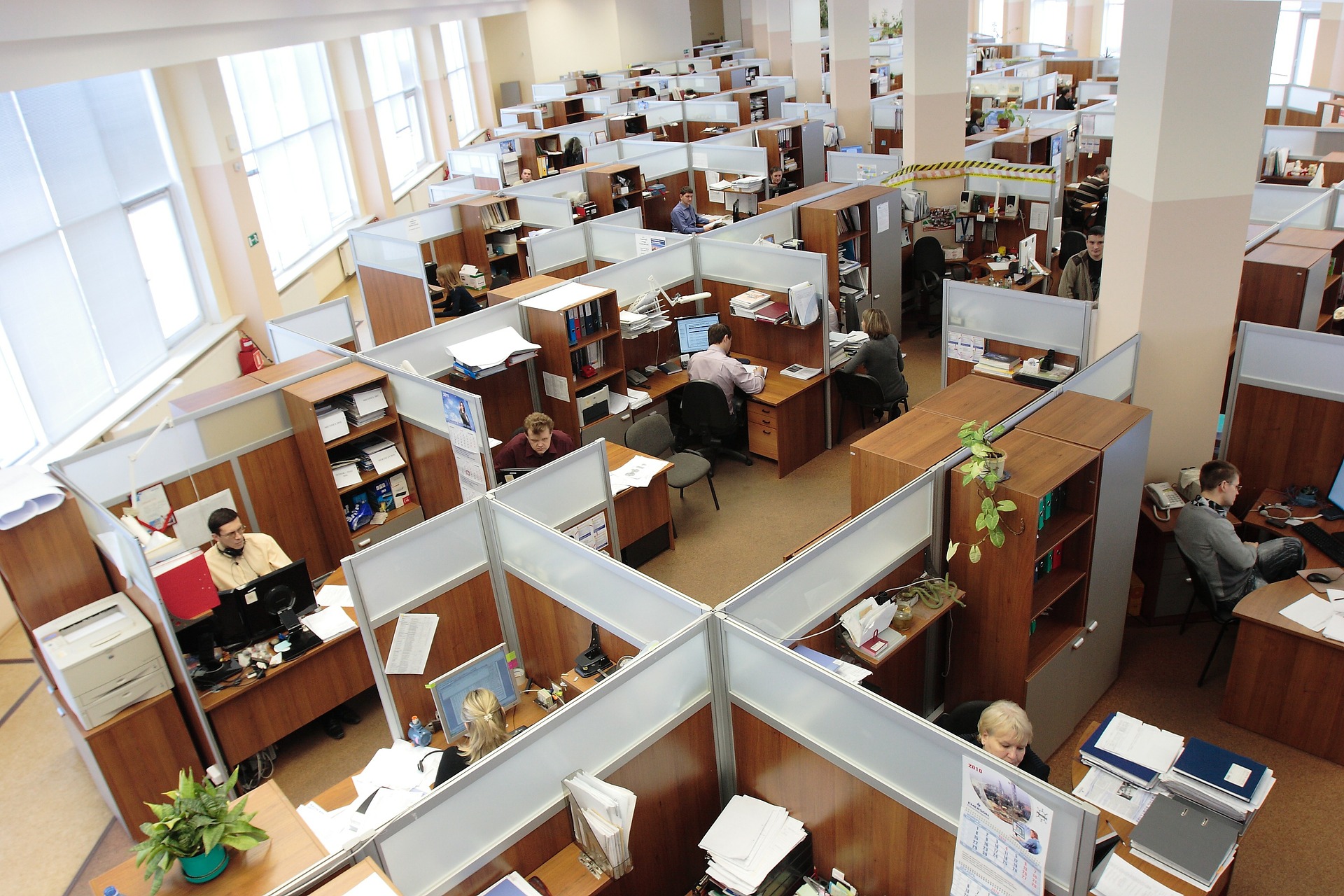 A aerial view of an office with cubicles 