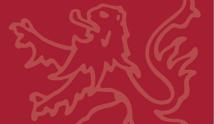 Lion from Harvard crest on crimson background