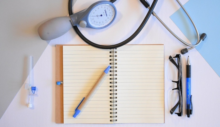 Doctor's notebook and tools Image by marijana1 from Pixabay 