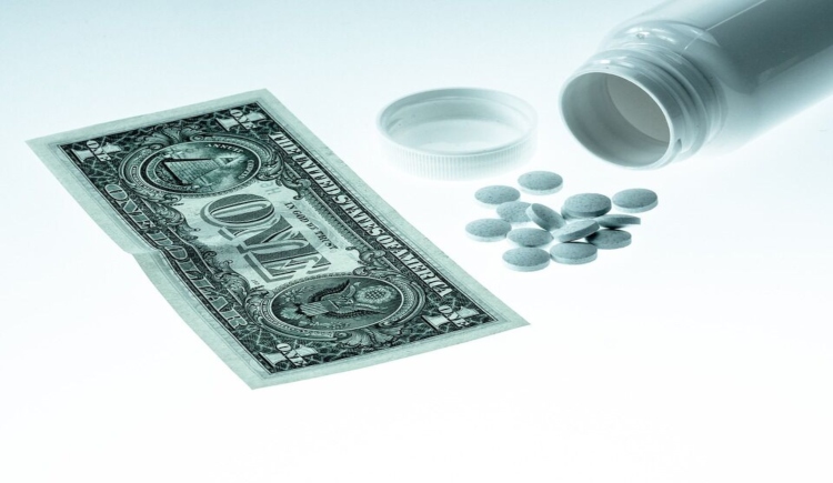 Dollar bill with pills