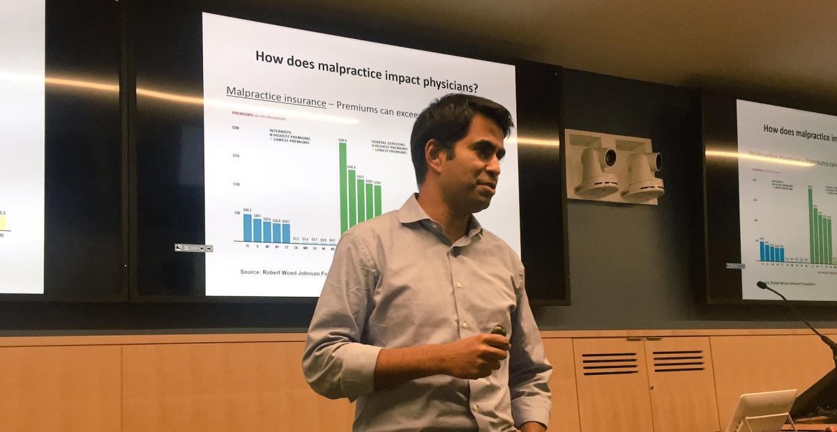 Anupam Jena teaching a class